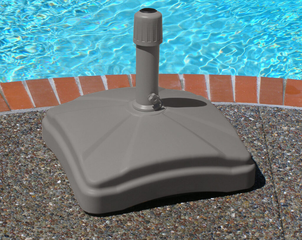 gray umbrella base by pool